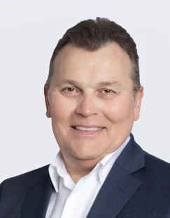 John S. Wood, a Certified Public Accountant (CPA) and IRS tax resolution specialist, wearing professional attire with a confident expression.